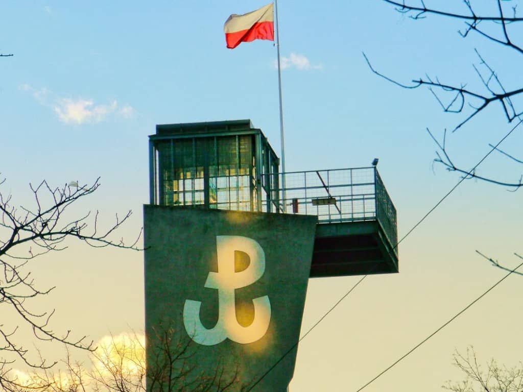 tower of uprising museum with polish flag